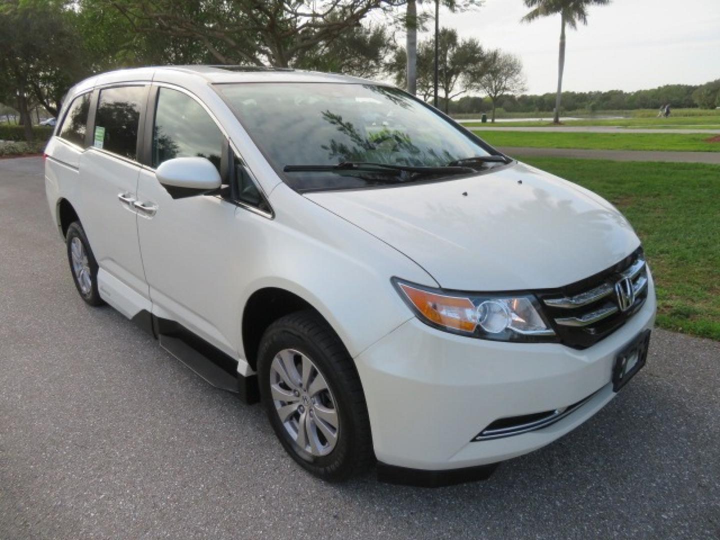 2016 White /Truffle Honda Odyssey (5FNRL5H63GB) , Automatic transmission, located at 4301 Oak Circle #19, Boca Raton, FL, 33431, (954) 561-2499, 26.388861, -80.084038 - You are looking at Gorgeous Pearl White Diamond 2016 Honda Odyssey EX-L VMI Northstar Handicap Wheelchair Conversion Van with 79K Original Miles, In-Floor Power Side Entry Ramp with Kneeling Van Function, Passenger Side 6 Way Transfer Seat, Quick Release Driver's Seat, Hand Controls, Tie Down System - Photo#20